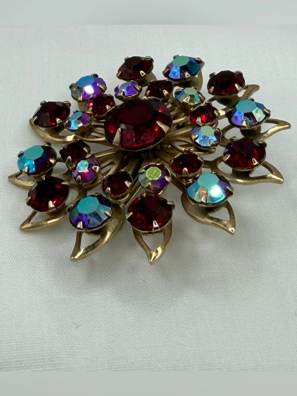 Vintage Starburst Brooch Pin Goldtone Faceted Deep Red Iridescent Rhinestones